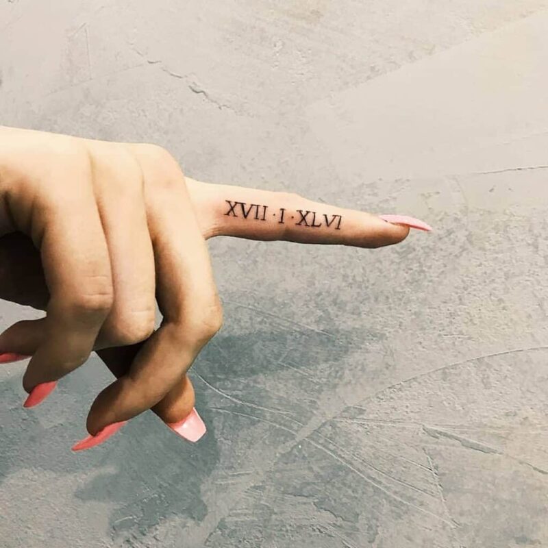 24 Radiant Roman Number Tattoos To Mark A Memorable Date