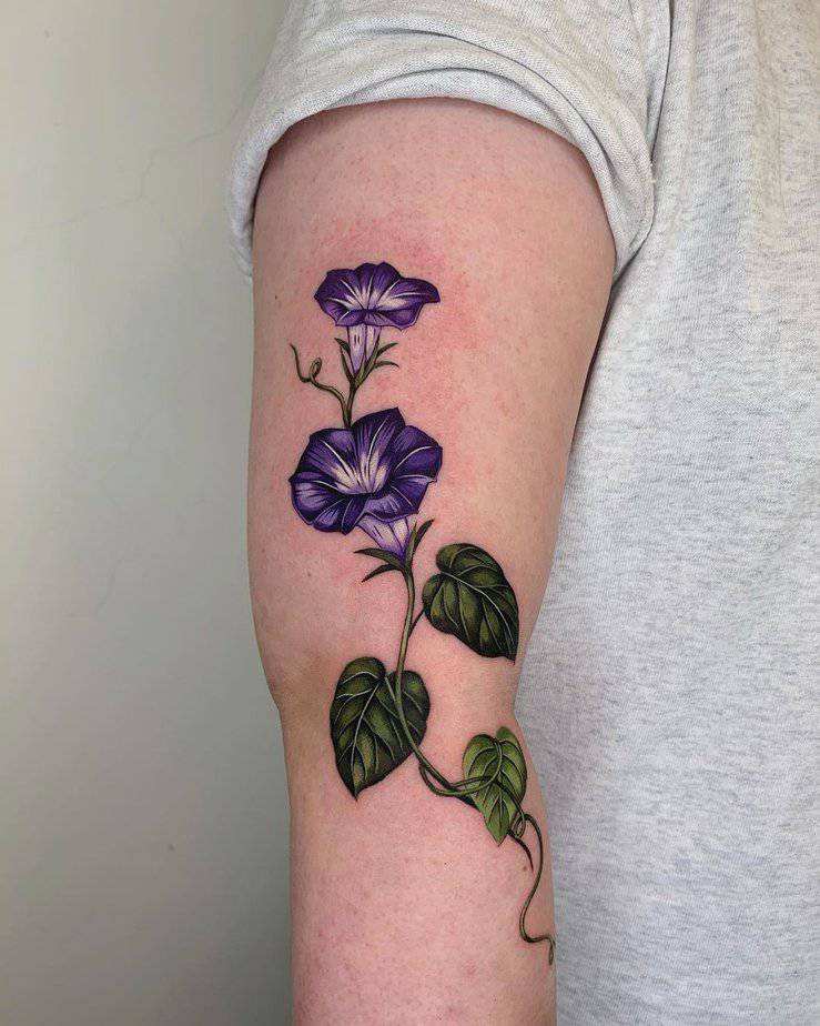 Indigo flower tattoo