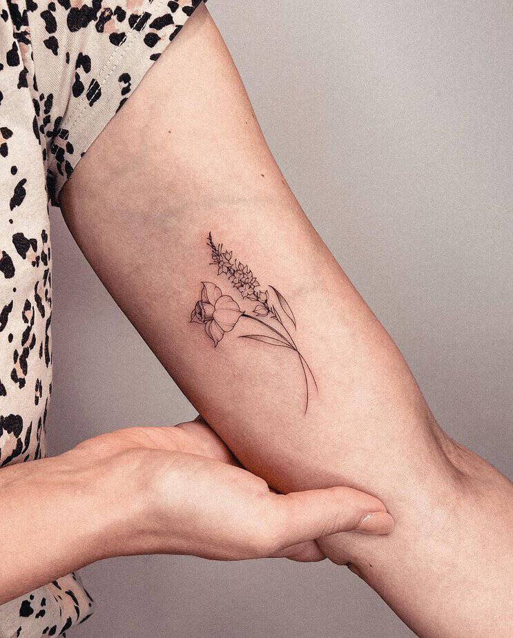 Larkspur and daffodil tattoo