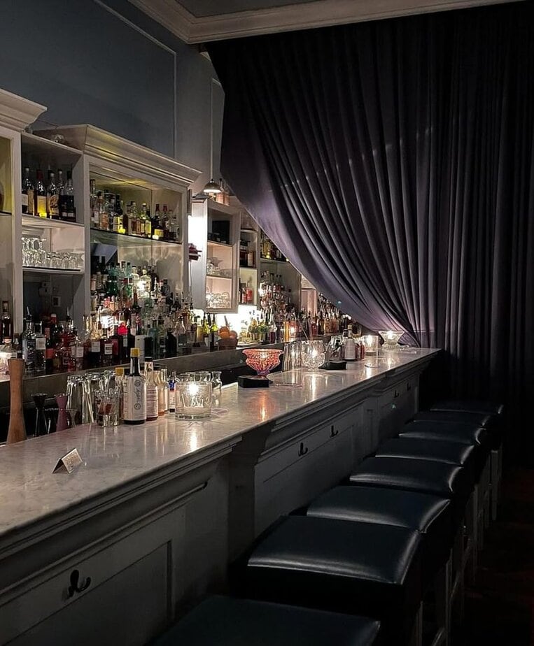 Dine at The Violet Hour's Hidden Speakeasy Vibe