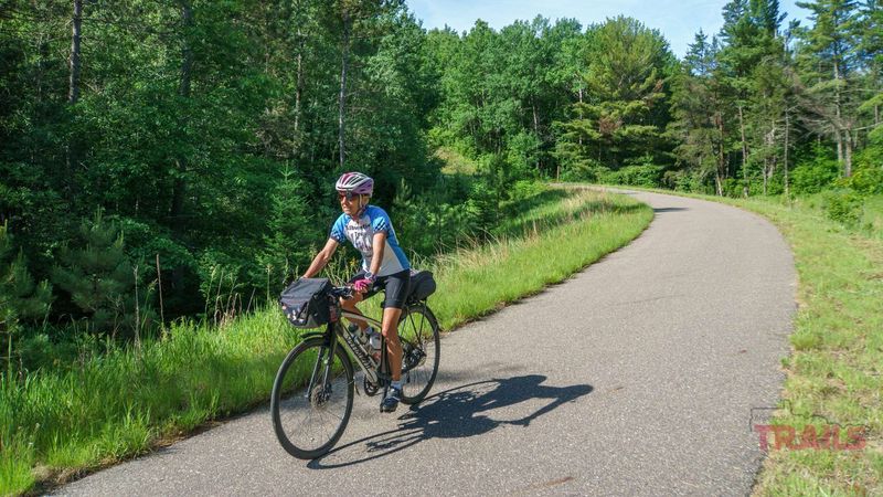 14 Unforgettable Rail Trails Through Northern USA's Best Landscapes Paul Bunyan State Trail (Brainerd, Minnesota)