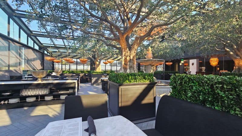 Panoramic Views and Garden-Glass Ambiance