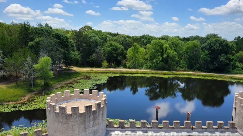 Wait Until You See This Castle Airbnb Hidden in Texas Photo Spots: Moat Reflections and Rooftop Lines