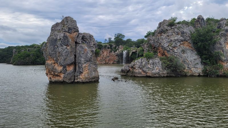 Hidden Waterfall Approach Through the Canyon