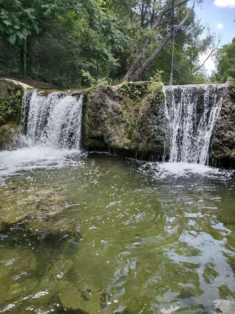 This Stunning 2.7-Mile Texas Hike Ends With Waterfalls And Wildflowers Waterfalls, Swimming Holes, and Creek Crossings