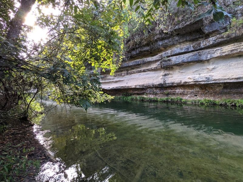 This Stunning 2.7-Mile Texas Hike Ends With Waterfalls And Wildflowers Local Logistics: Hours, Access, and Nearby Eats