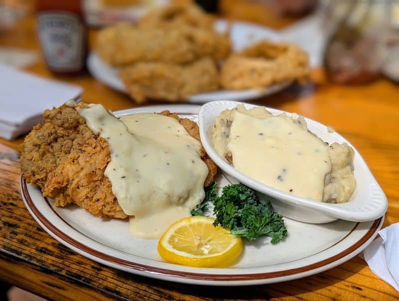 You Can Eat Inside An Abandoned 1800s Cotton Gin In Texas Hill Country Comfort Classics: Chicken Fried Steak & Chicken