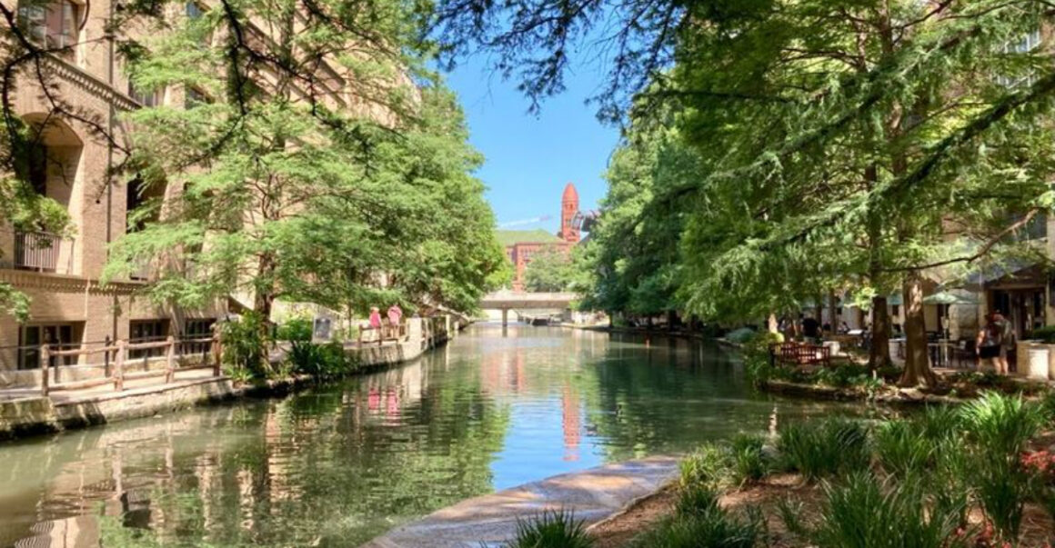 this iconic river walk comes alive with tacos mariachis and twinkling lights