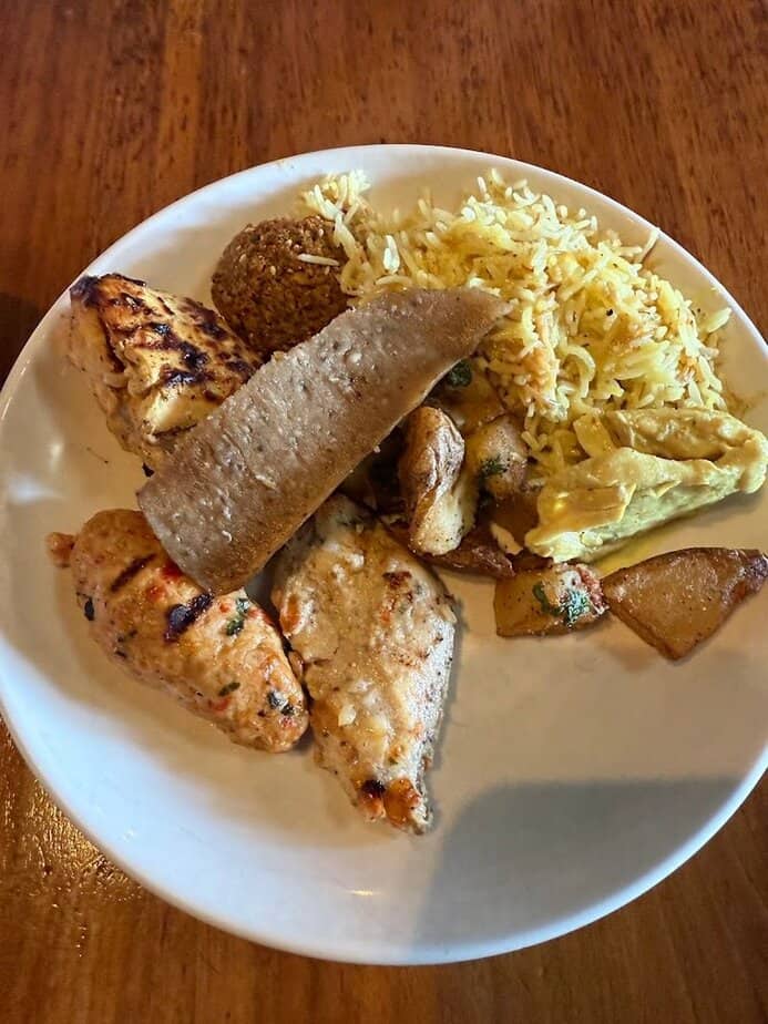 People Drive Across Texas for This Legendary Mediterranean Buffet Saffron Chicken and Rice