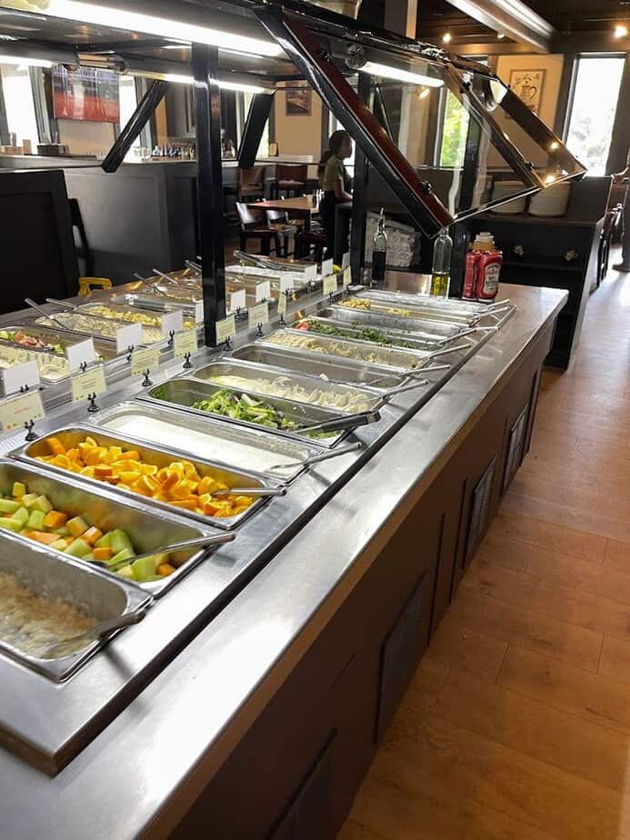 People Drive Across Texas for This Legendary Mediterranean Buffet Salad Bar and Pickles Corner