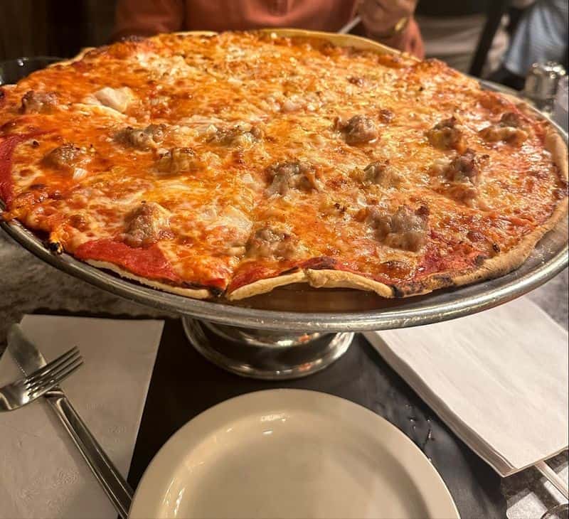 The paper-thin crust is what keeps locals coming back