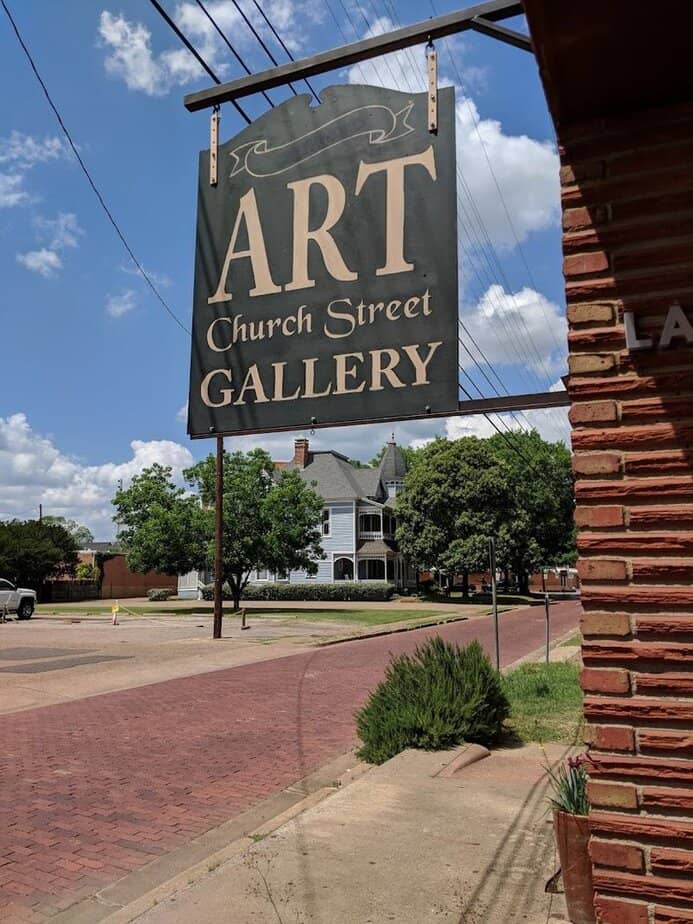This Small Texas Town Might Surprise You With Its Historic Streets and Great Shops Cole Art Center at The Old Opera House