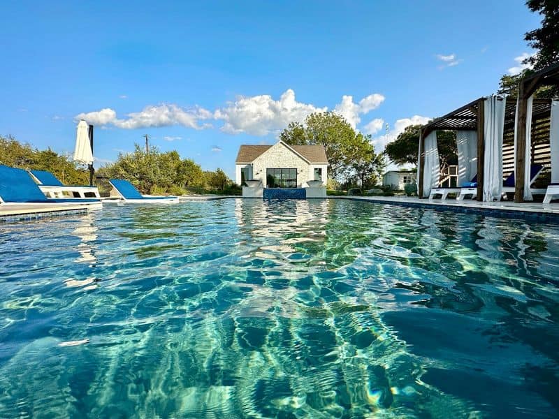 This Texas Ranch Stay Has A Private Beach, Baby Animals & Treehouses Cowboy Hot Tubs with a View