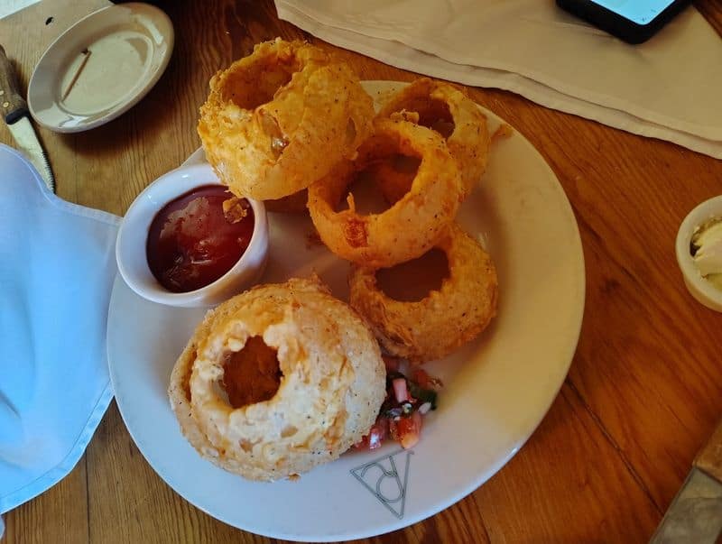 You’ll Drive Miles Out of Your Way for This Texas Restaurant — And Have Zero Regrets Onion Rings and Alpine Nachos