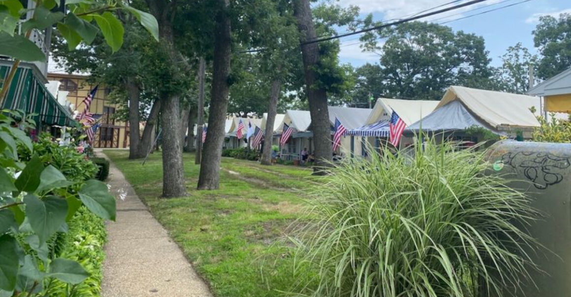 a historic new jersey village with over 100 tents lined up along the coast