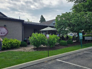 most people dont know about this cozy bistro hiding in a rustic ohio log cabin