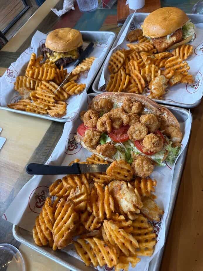 This Laid Back Texas Beach Spot Serves Incredible Food With a Gulf View Wings, Waffle Fries, and Game Time
