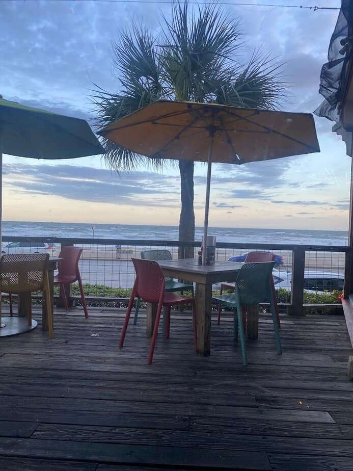 This Laid Back Texas Beach Spot Serves Incredible Food With a Gulf View Oceanfront Deck Experience