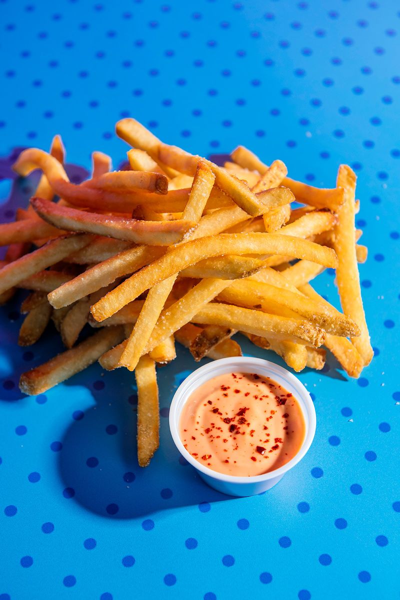 This Haunted-Looking Michigan Diner Serves Burgers And Fries Under A Ghostly Neon Glow Fries Worth Fighting Over
