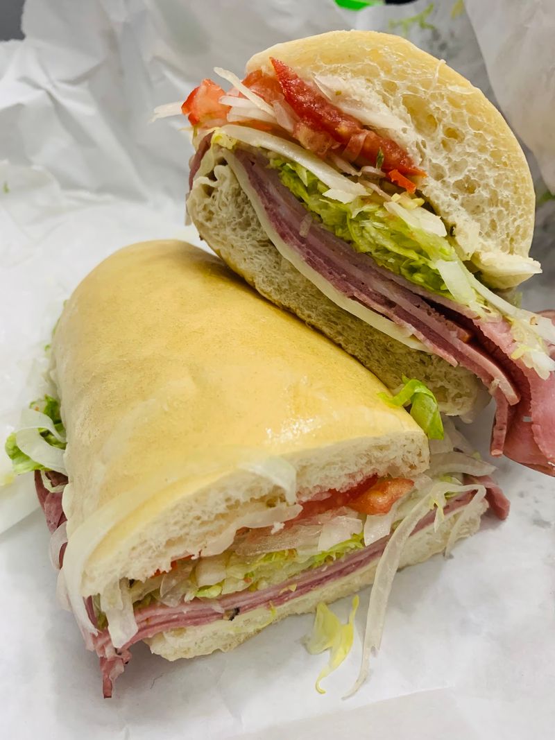 This Old-School Italian Deli In Michigan Has Been Stacking Sandwiches The Same Way Since 1946 The Italian Sub at the Heart of the Counter