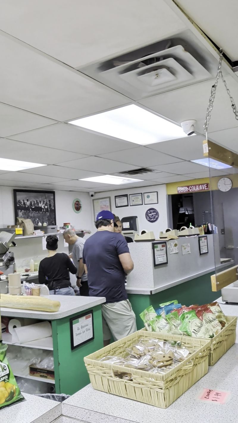 This Old-School Italian Deli In Michigan Has Been Stacking Sandwiches The Same Way Since 1946 Fast Hands Behind the Deli Case