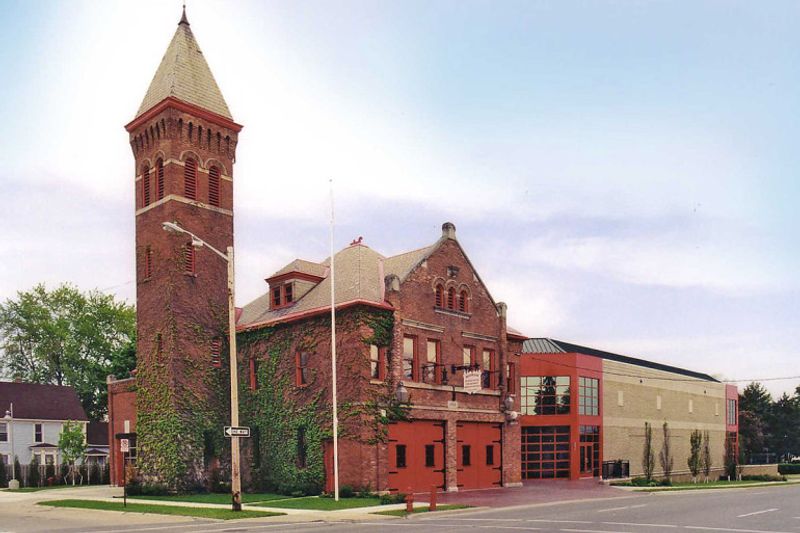 This Under-The-Radar Firefighting Museum In Michigan Is A Free Day Out Kids Talk About For Weeks A Brick Firehouse on West Cross Street